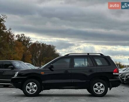 Чорний Хендай Санта Фе, об'ємом двигуна 2.7 л та пробігом 231 тис. км за 6490 $, фото 4 на Automoto.ua