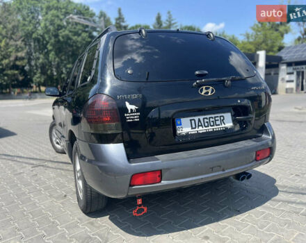 Черный Хендай Санта Фе, объемом двигателя 2.4 л и пробегом 300 тыс. км за 5800 $, фото 8 на Automoto.ua