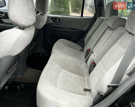 Черный Хендай Санта Фе, объемом двигателя 2 л и пробегом 270 тыс. км за 4300 $, фото 10 на Automoto.ua