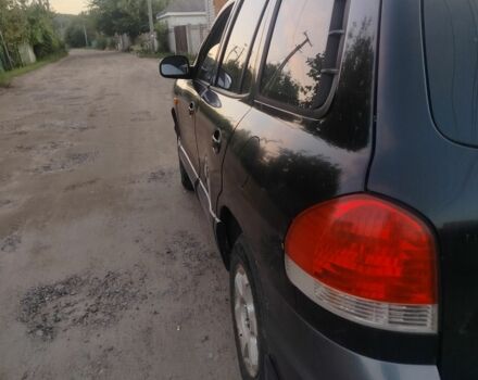 Черный Хендай Санта Фе, объемом двигателя 2 л и пробегом 272 тыс. км за 3900 $, фото 4 на Automoto.ua