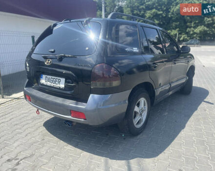 Черный Хендай Санта Фе, объемом двигателя 2.4 л и пробегом 300 тыс. км за 5800 $, фото 10 на Automoto.ua