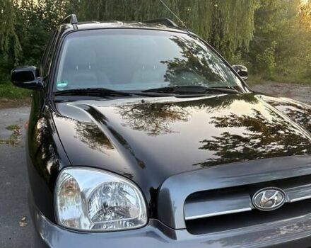 Черный Хендай Санта Фе, объемом двигателя 2.4 л и пробегом 175 тыс. км за 6800 $, фото 5 на Automoto.ua