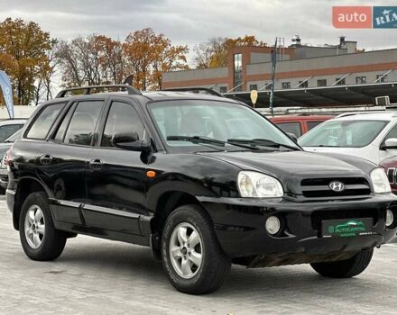 Чорний Хендай Санта Фе, об'ємом двигуна 2.7 л та пробігом 231 тис. км за 6490 $, фото 5 на Automoto.ua