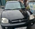 Черный Хендай Санта Фе, объемом двигателя 1.99 л и пробегом 190 тыс. км за 5950 $, фото 1 на Automoto.ua