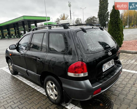 Черный Хендай Санта Фе, объемом двигателя 2 л и пробегом 270 тыс. км за 4300 $, фото 4 на Automoto.ua