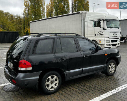 Черный Хендай Санта Фе, объемом двигателя 2 л и пробегом 270 тыс. км за 4300 $, фото 6 на Automoto.ua