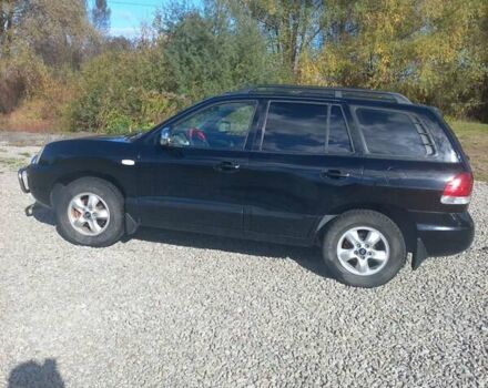 Черный Хендай Санта Фе, объемом двигателя 2.35 л и пробегом 313 тыс. км за 5500 $, фото 6 на Automoto.ua