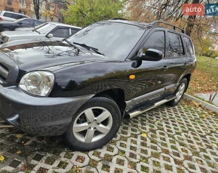 Черный Хендай Санта Фе, объемом двигателя 2 л и пробегом 225 тыс. км за 5850 $, фото 5 на Automoto.ua