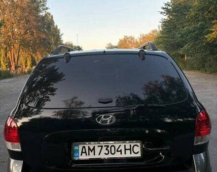 Черный Хендай Санта Фе, объемом двигателя 2.4 л и пробегом 175 тыс. км за 6800 $, фото 1 на Automoto.ua