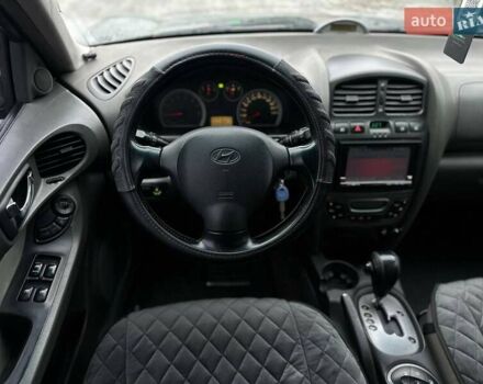 Чорний Хендай Санта Фе, об'ємом двигуна 2.7 л та пробігом 231 тис. км за 6490 $, фото 18 на Automoto.ua
