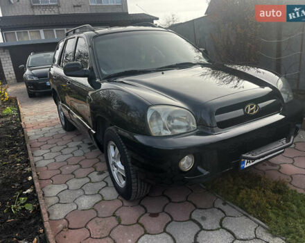 Черный Хендай Санта Фе, объемом двигателя 2.4 л и пробегом 309 тыс. км за 5900 $, фото 1 на Automoto.ua