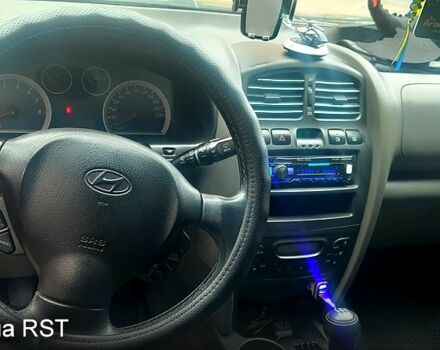 Черный Хендай Санта Фе, объемом двигателя 2.4 л и пробегом 330 тыс. км за 6300 $, фото 2 на Automoto.ua