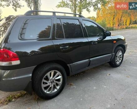 Черный Хендай Санта Фе, объемом двигателя 2.4 л и пробегом 175 тыс. км за 6800 $, фото 2 на Automoto.ua