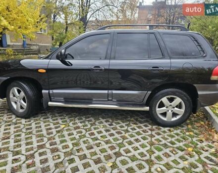 Черный Хендай Санта Фе, объемом двигателя 2 л и пробегом 225 тыс. км за 5850 $, фото 1 на Automoto.ua