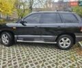 Черный Хендай Санта Фе, объемом двигателя 2 л и пробегом 225 тыс. км за 5850 $, фото 1 на Automoto.ua