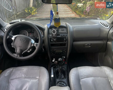 Черный Хендай Санта Фе, объемом двигателя 2.4 л и пробегом 309 тыс. км за 5900 $, фото 6 на Automoto.ua