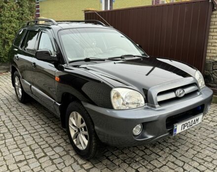 Чорний Хендай Санта Фе, об'ємом двигуна 2.35 л та пробігом 186 тис. км за 6000 $, фото 1 на Automoto.ua