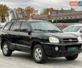 Чорний Хендай Санта Фе, об'ємом двигуна 2.7 л та пробігом 231 тис. км за 5990 $, фото 5 на Automoto.ua