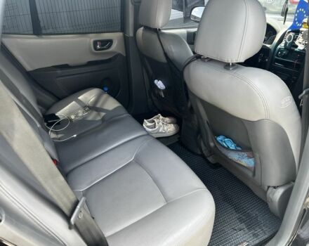 Черный Хендай Санта Фе, объемом двигателя 2.4 л и пробегом 297 тыс. км за 5700 $, фото 7 на Automoto.ua