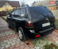 Черный Хендай Санта Фе, объемом двигателя 2.4 л и пробегом 309 тыс. км за 5900 $, фото 2 на Automoto.ua