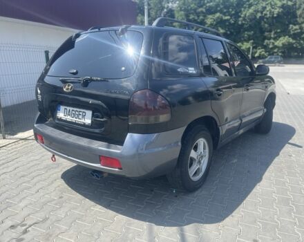 Черный Хендай Санта Фе, объемом двигателя 2.4 л и пробегом 297 тыс. км за 5700 $, фото 2 на Automoto.ua