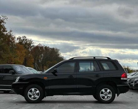 Чорний Хендай Санта Фе, об'ємом двигуна 2.7 л та пробігом 231 тис. км за 6490 $, фото 4 на Automoto.ua