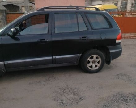 Черный Хендай Санта Фе, объемом двигателя 2 л и пробегом 272 тыс. км за 3900 $, фото 2 на Automoto.ua