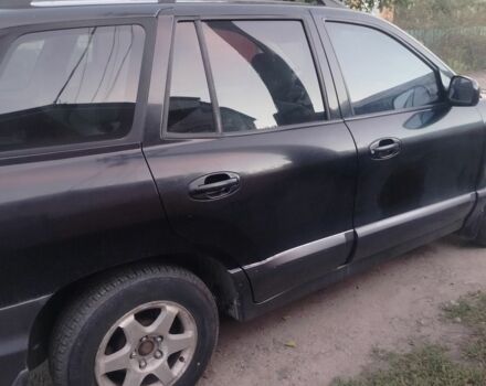 Черный Хендай Санта Фе, объемом двигателя 2 л и пробегом 272 тыс. км за 3900 $, фото 8 на Automoto.ua