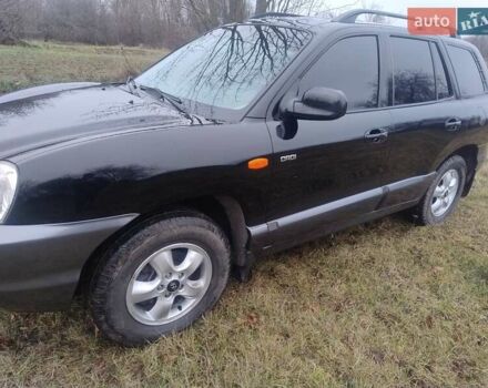 Чорний Хендай Санта Фе, об'ємом двигуна 2 л та пробігом 203 тис. км за 7100 $, фото 1 на Automoto.ua