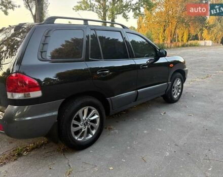 Черный Хендай Санта Фе, объемом двигателя 2.4 л и пробегом 175 тыс. км за 6800 $, фото 11 на Automoto.ua