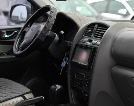 Чорний Хендай Санта Фе, об'ємом двигуна 2.7 л та пробігом 231 тис. км за 6490 $, фото 11 на Automoto.ua