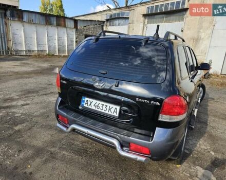 Черный Хендай Санта Фе, объемом двигателя 2 л и пробегом 225 тыс. км за 5850 $, фото 14 на Automoto.ua