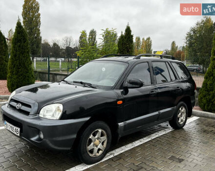Черный Хендай Санта Фе, объемом двигателя 2 л и пробегом 270 тыс. км за 4300 $, фото 1 на Automoto.ua