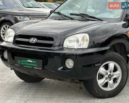 Чорний Хендай Санта Фе, об'ємом двигуна 2.7 л та пробігом 231 тис. км за 5990 $, фото 1 на Automoto.ua