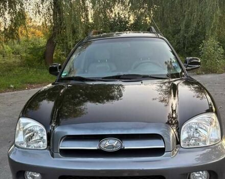 Черный Хендай Санта Фе, объемом двигателя 2.4 л и пробегом 175 тыс. км за 6800 $, фото 4 на Automoto.ua