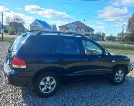 Черный Хендай Санта Фе, объемом двигателя 2.35 л и пробегом 313 тыс. км за 5500 $, фото 5 на Automoto.ua