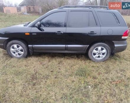 Чорний Хендай Санта Фе, об'ємом двигуна 2 л та пробігом 203 тис. км за 7100 $, фото 2 на Automoto.ua