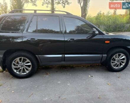 Черный Хендай Санта Фе, объемом двигателя 2.4 л и пробегом 175 тыс. км за 6800 $, фото 10 на Automoto.ua