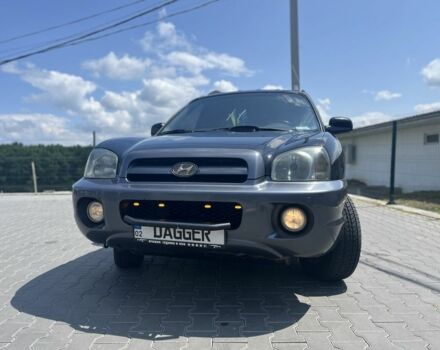 Черный Хендай Санта Фе, объемом двигателя 2.4 л и пробегом 297 тыс. км за 5700 $, фото 1 на Automoto.ua