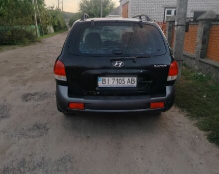 Черный Хендай Санта Фе, объемом двигателя 2 л и пробегом 272 тыс. км за 3900 $, фото 3 на Automoto.ua