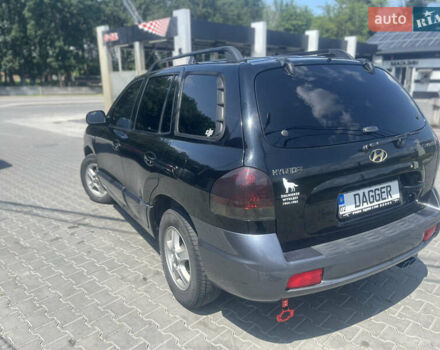 Черный Хендай Санта Фе, объемом двигателя 2.4 л и пробегом 300 тыс. км за 5800 $, фото 9 на Automoto.ua