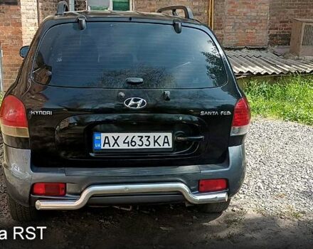 Черный Хендай Санта Фе, объемом двигателя 2 л и пробегом 200 тыс. км за 5100 $, фото 1 на Automoto.ua