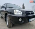 Черный Хендай Санта Фе, объемом двигателя 2.66 л и пробегом 195 тыс. км за 5699 $, фото 1 на Automoto.ua