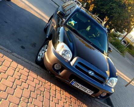 Чорний Хендай Санта Фе, об'ємом двигуна 2 л та пробігом 317 тис. км за 6900 $, фото 2 на Automoto.ua