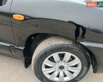 Черный Хендай Санта Фе, объемом двигателя 2.66 л и пробегом 195 тыс. км за 5699 $, фото 22 на Automoto.ua