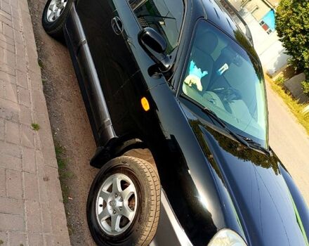 Чорний Хендай Санта Фе, об'ємом двигуна 2 л та пробігом 317 тис. км за 6900 $, фото 1 на Automoto.ua