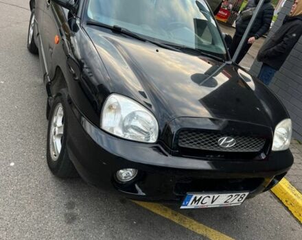 Чорний Хендай Санта Фе, об'ємом двигуна 2 л та пробігом 312 тис. км за 3550 $, фото 1 на Automoto.ua