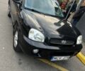 Чорний Хендай Санта Фе, об'ємом двигуна 2 л та пробігом 312 тис. км за 3550 $, фото 1 на Automoto.ua