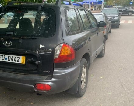 Черный Хендай Санта Фе, объемом двигателя 2 л и пробегом 218 тыс. км за 4200 $, фото 1 на Automoto.ua