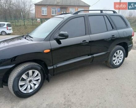 Черный Хендай Санта Фе, объемом двигателя 2.66 л и пробегом 195 тыс. км за 5699 $, фото 6 на Automoto.ua